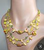 Collier plastron style cascade multi-rangs de perles verre lampwork tons jaune vert corail