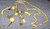 Collier long sautoir style ethnique inca pendentif breloques et perles tons bronze et jaune citron