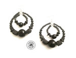 Boucles d'oreilles doubles créoles fantaisie style ethnique en perles de bois et lave noire