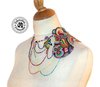 Collier cuir plastron asymétrique bijou de corps cascade de perles et chaines fantaisies